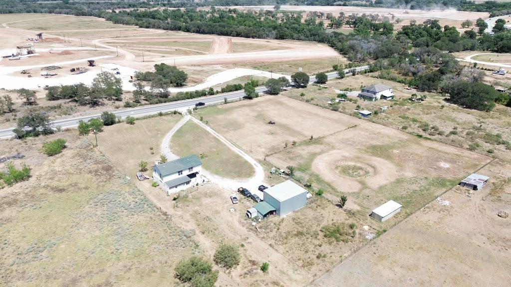 An aerial perspective showcases a spacious acreag