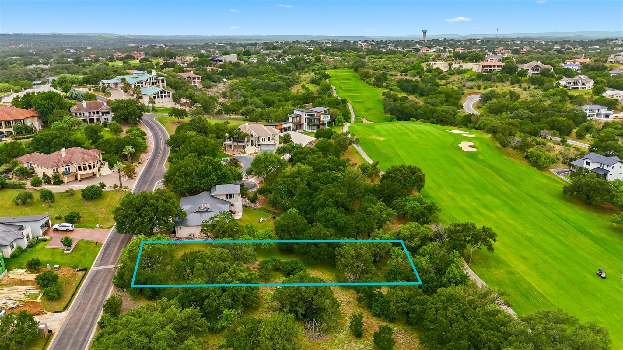 A prime golf course lot awaits your dream home.