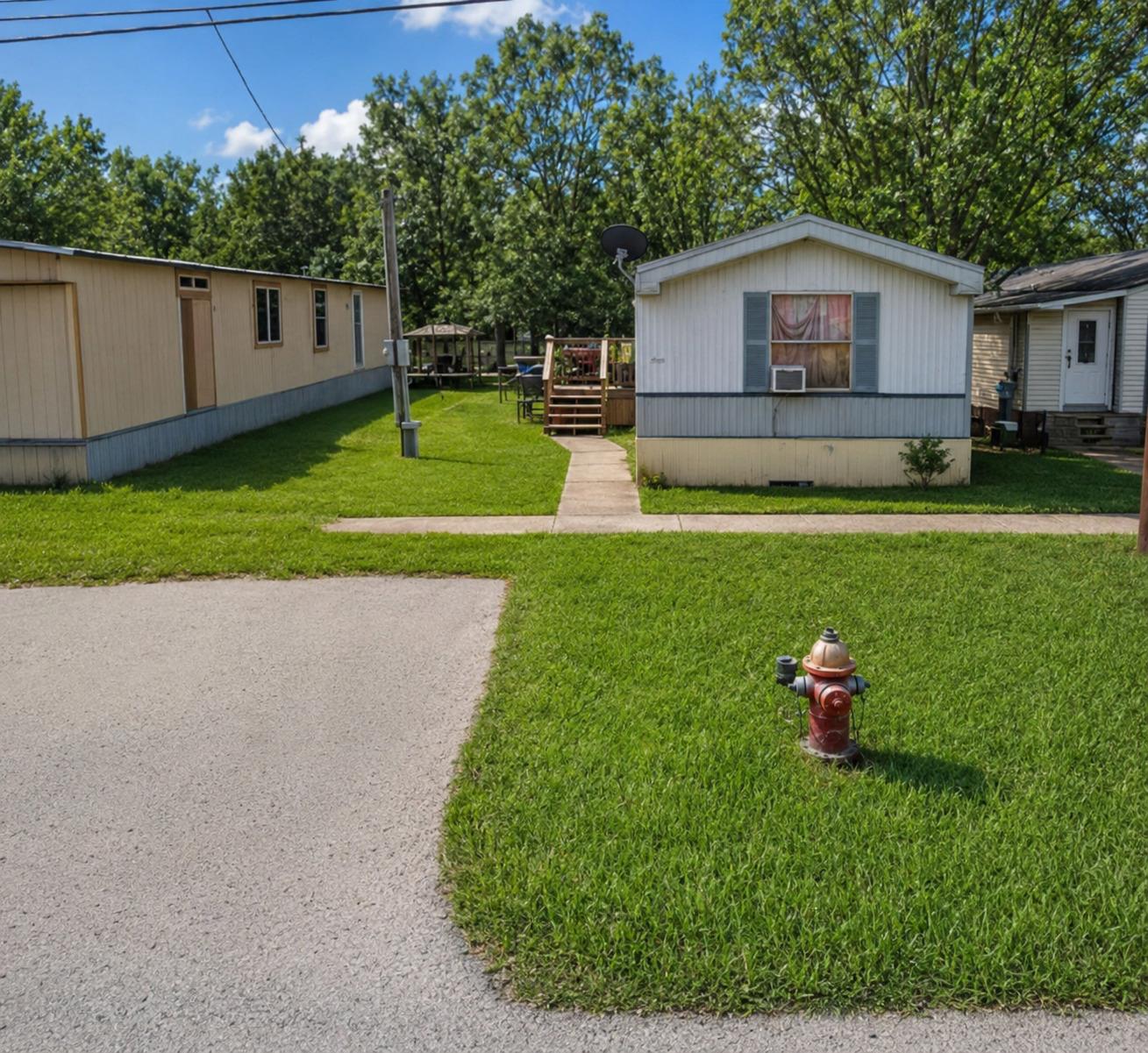 A well-maintained lawn welcomes you to this cozy 