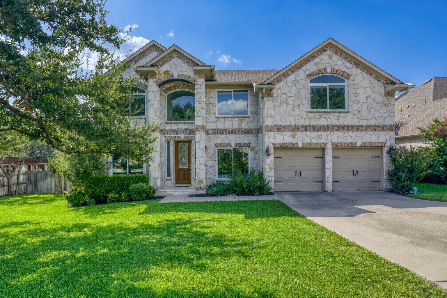 A striking stone facade with arched windows and t