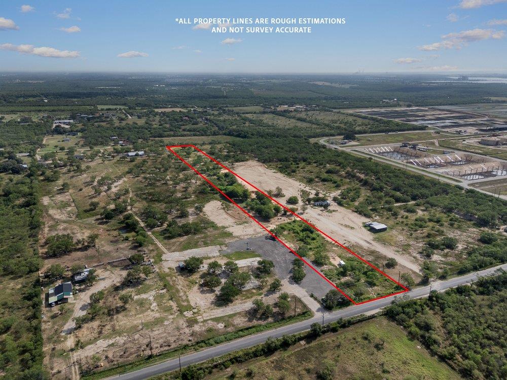 A vast, undeveloped parcel with direct road front