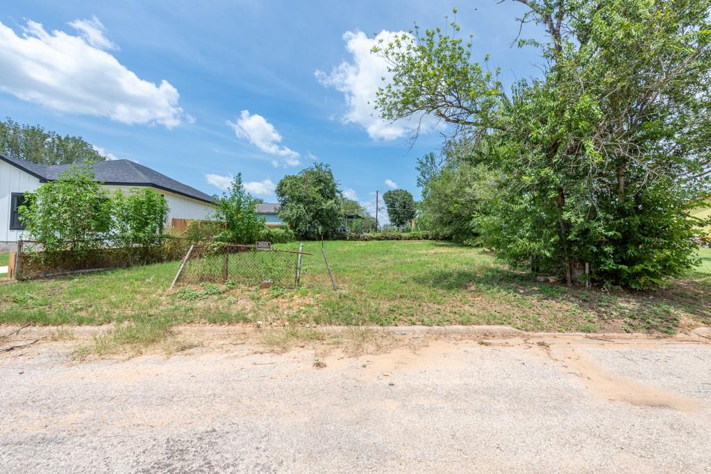 A generous, open parcel of land awaits your visio