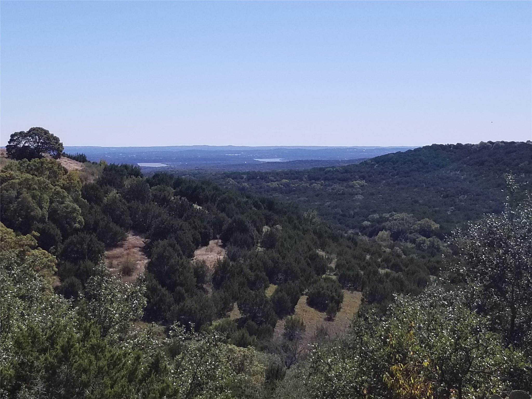 A tranquil panorama of rolling hills and distant 