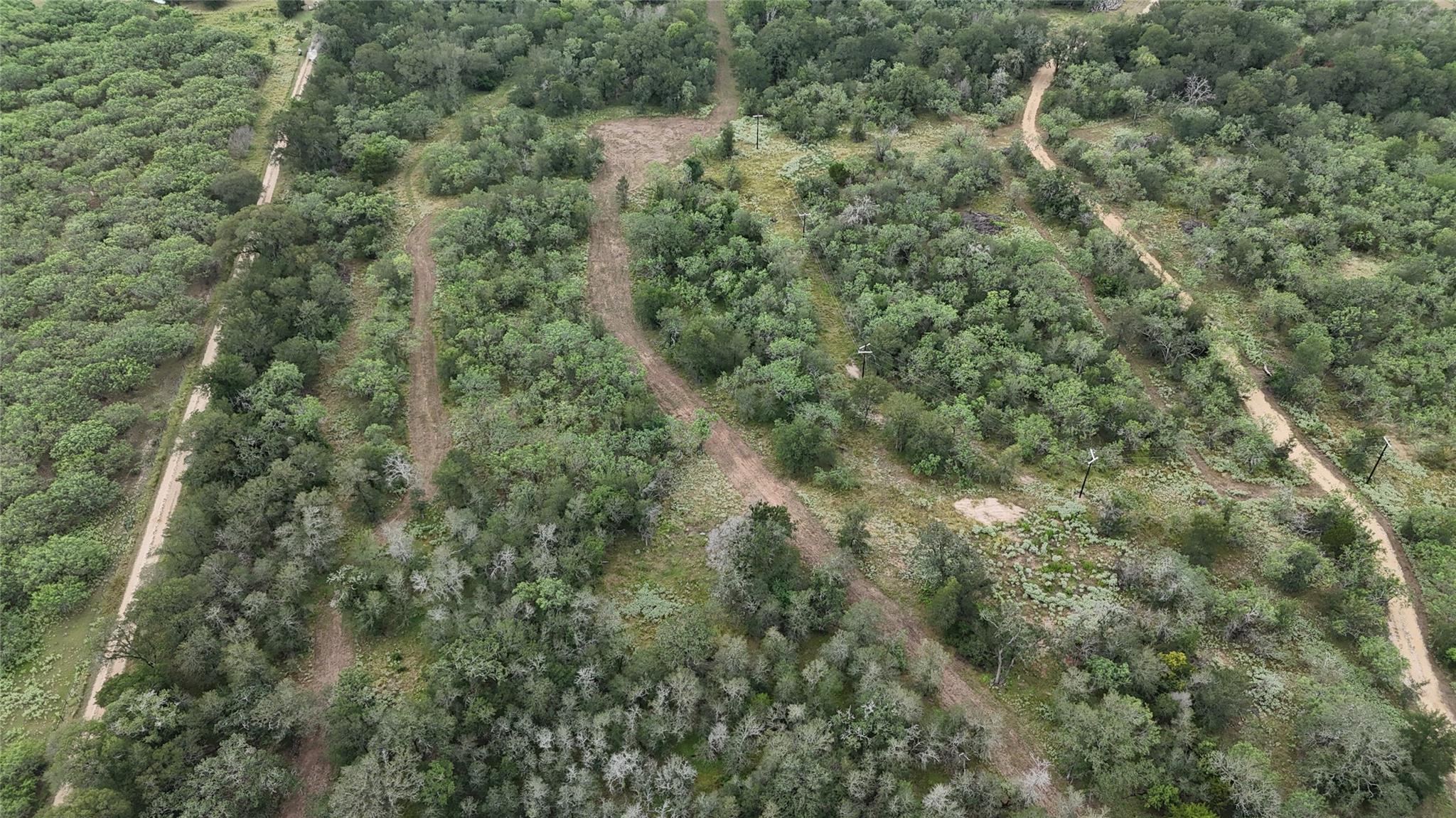 Vast, undeveloped acreage with multiple cleared p