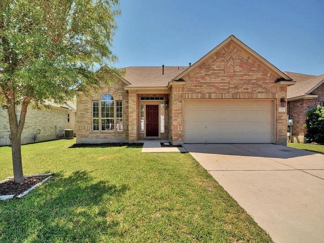 A classic brick facade welcomes you home, complet