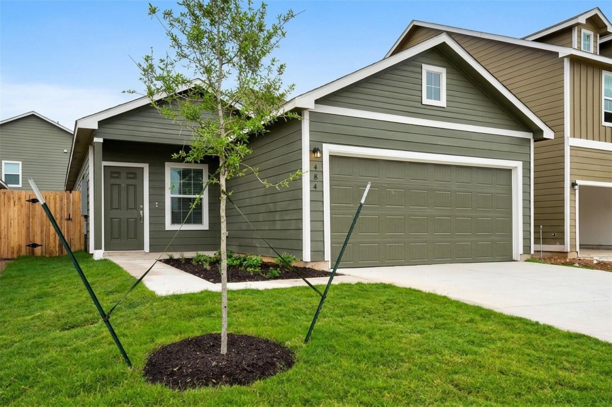 A welcoming facade with a well-maintained lawn an
