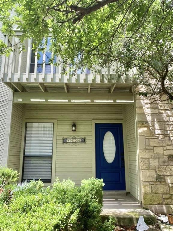 A vibrant blue door welcomes guests to this charm
