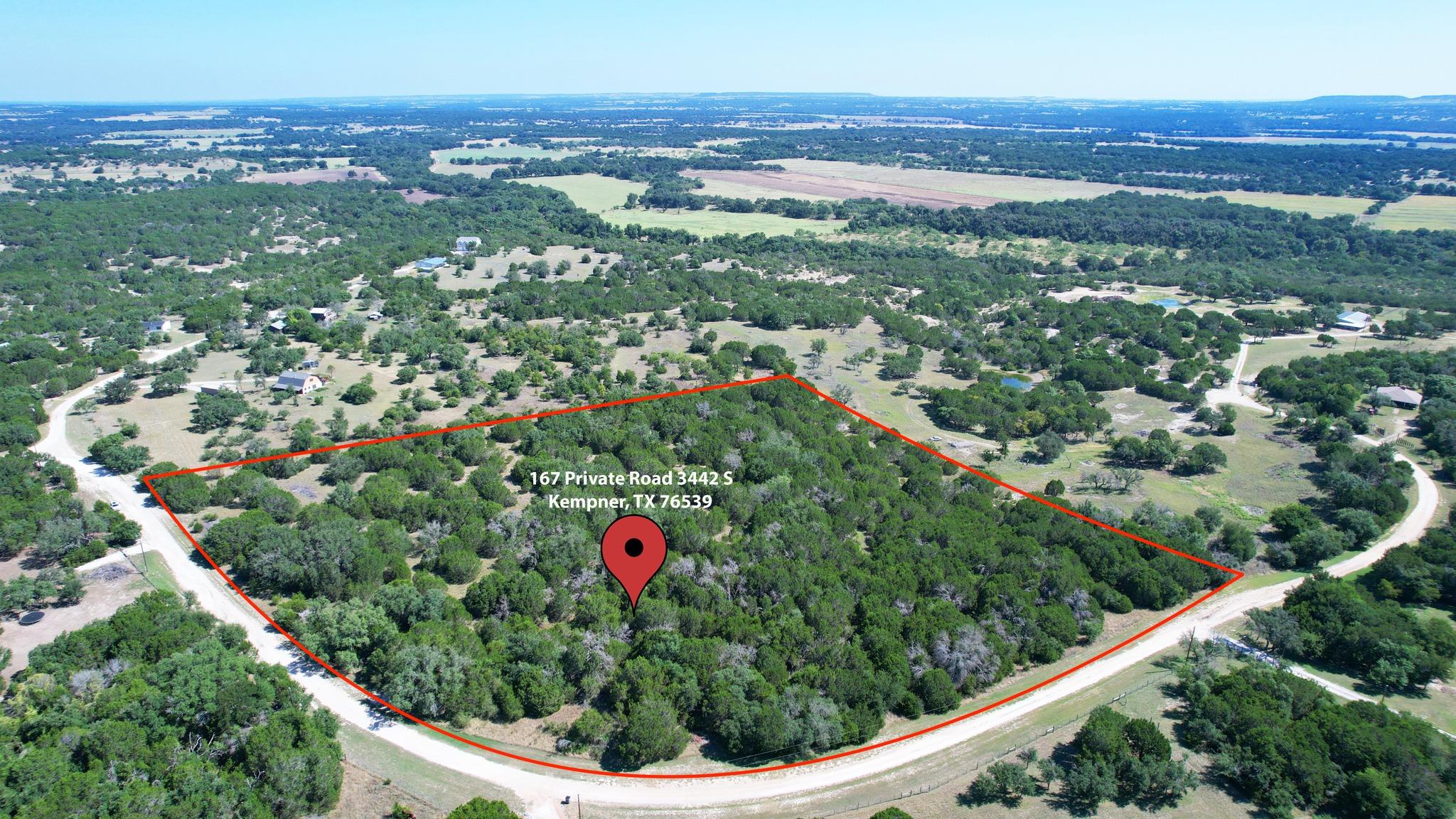 Discover a generously wooded lot, bordered by a c