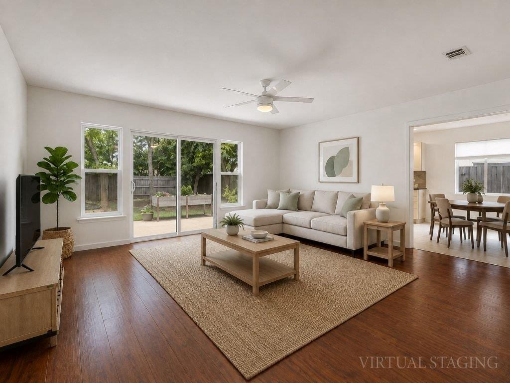 Wood flooring extends throughout this naturally i