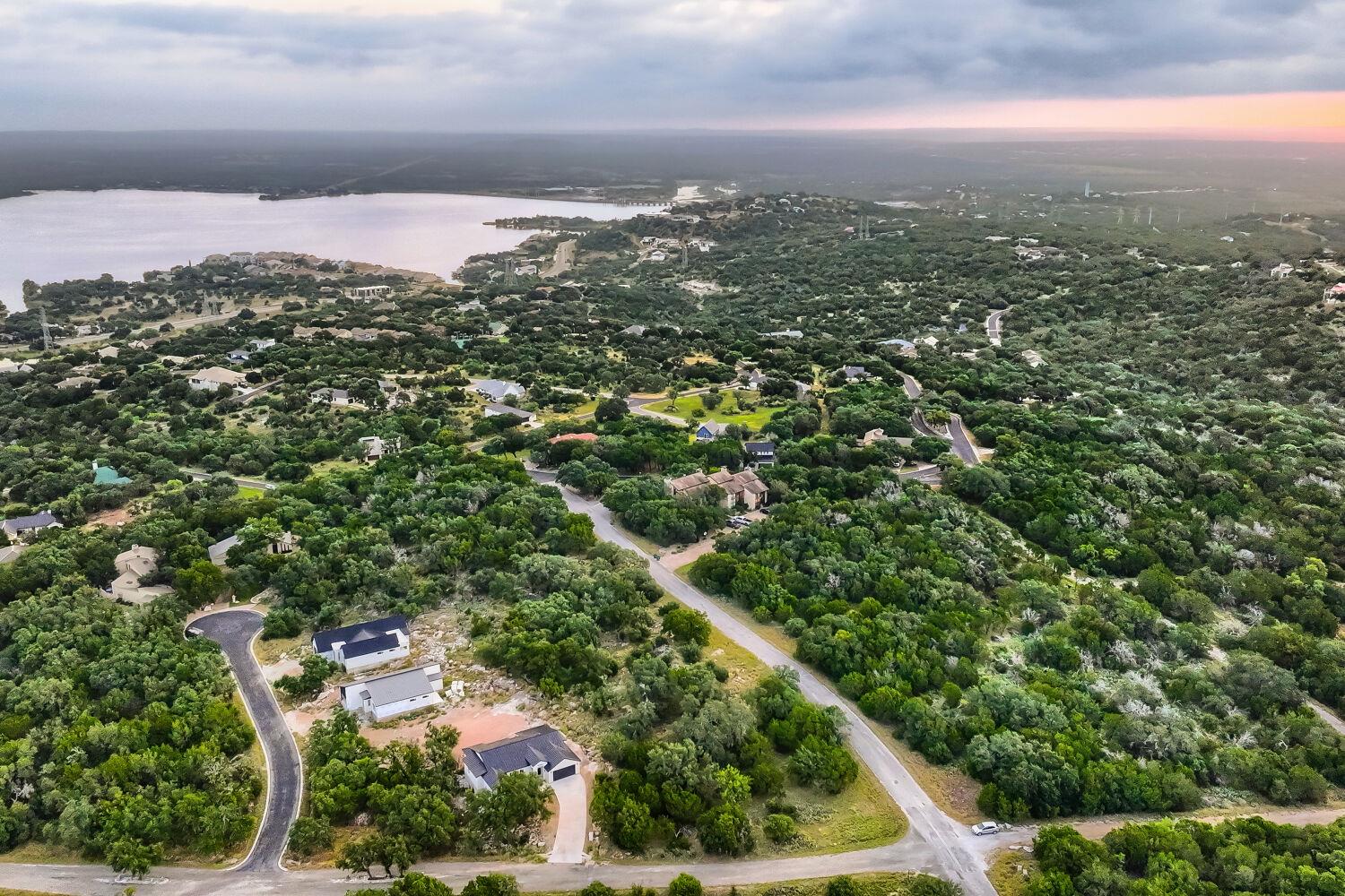 Aerial view captures a sprawling, verdant communi