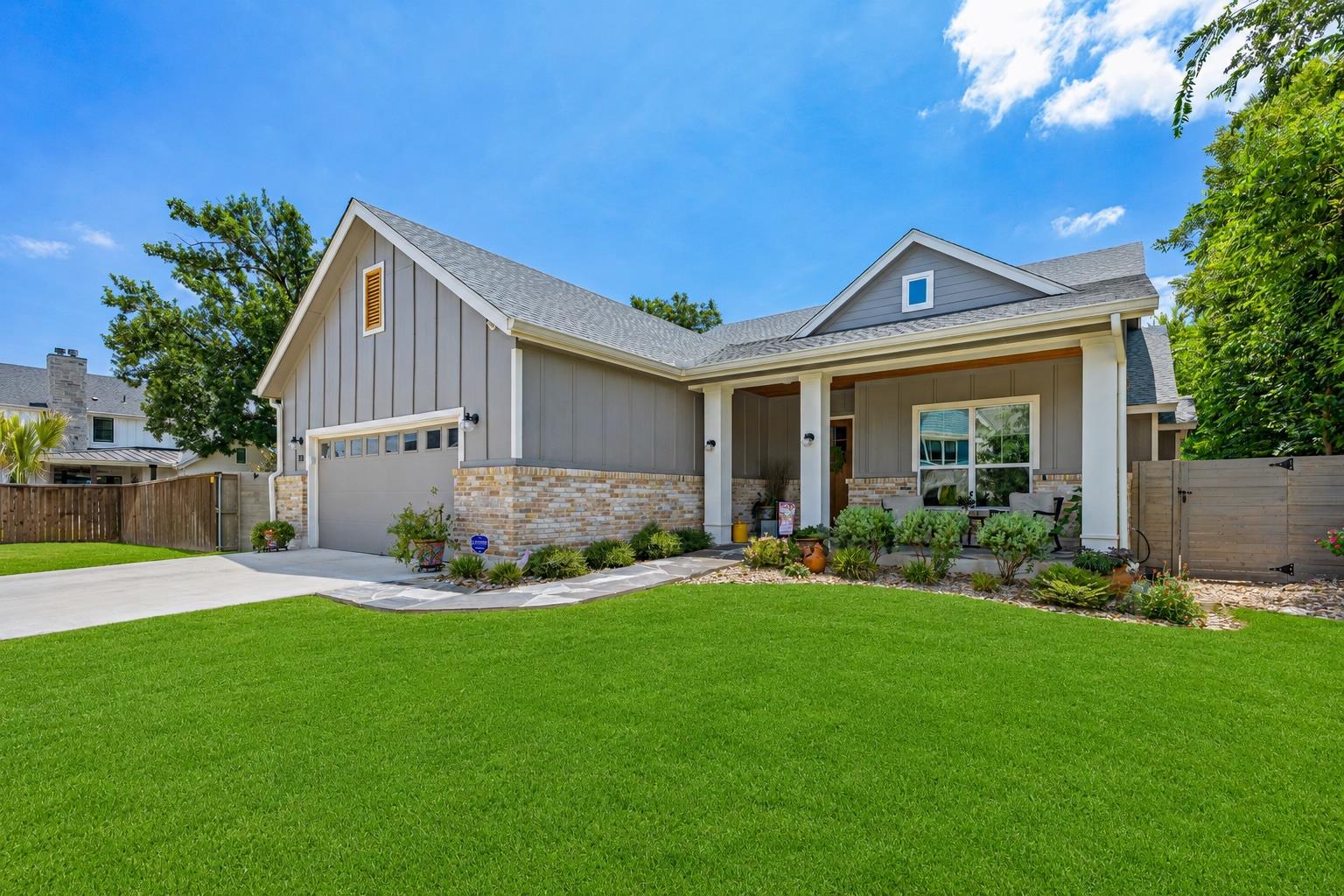 Board and batten siding meets rustic stone accent