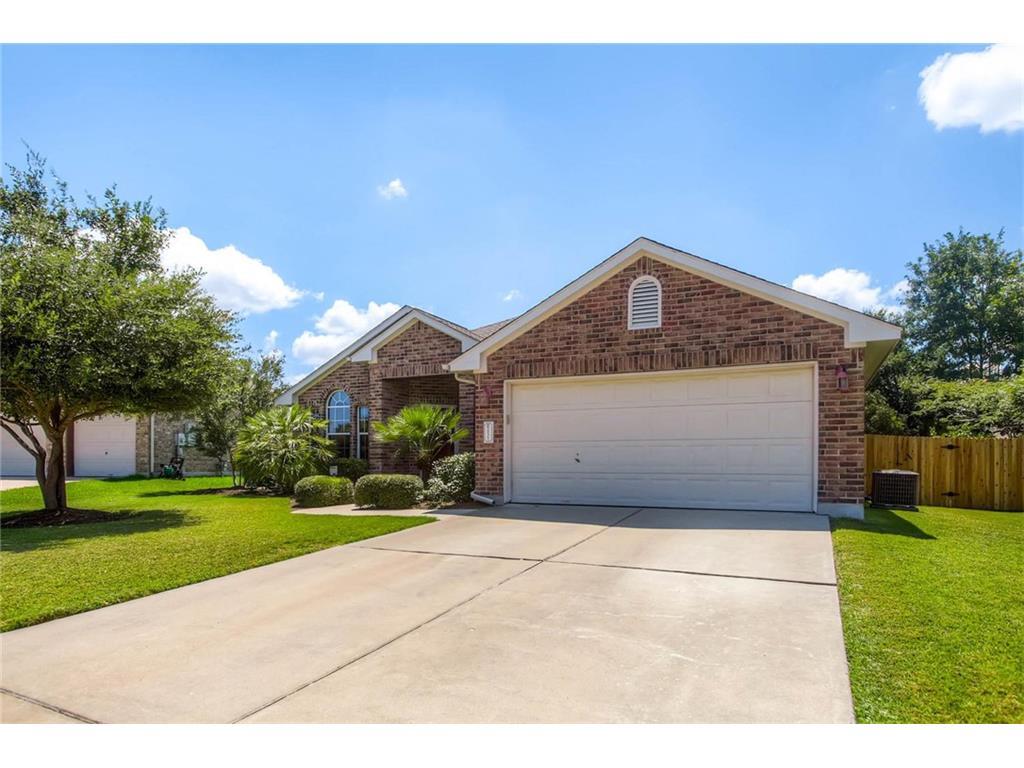 A well-maintained lawn and mature landscaping enh