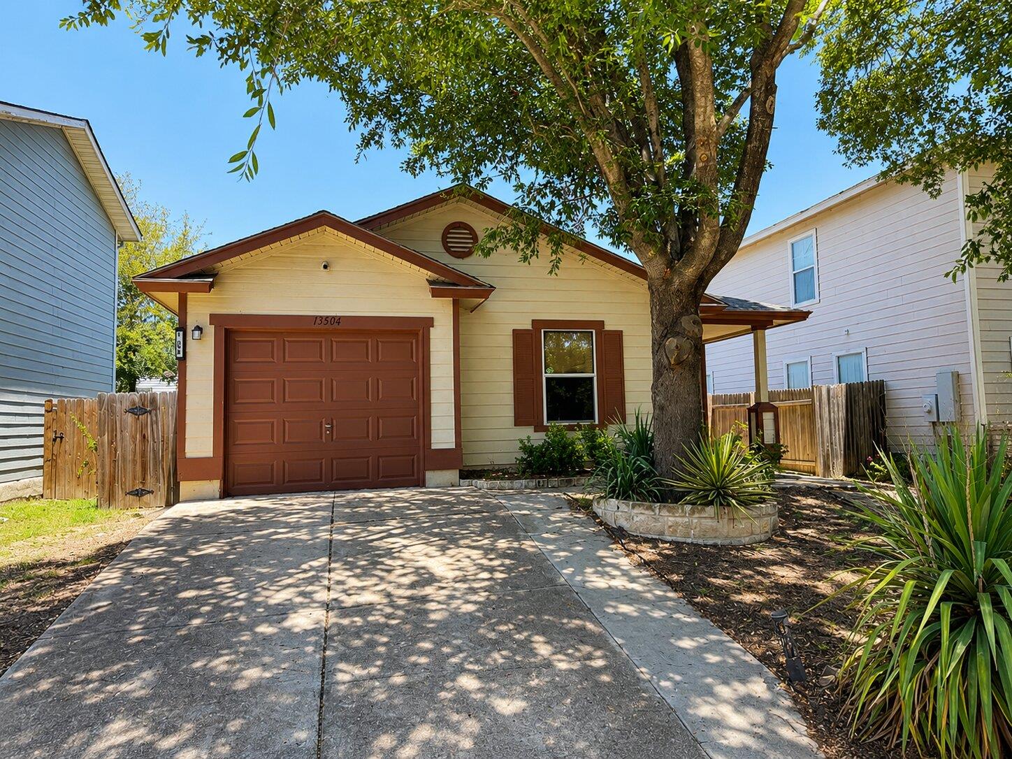 A welcoming front exterior features a covered ent