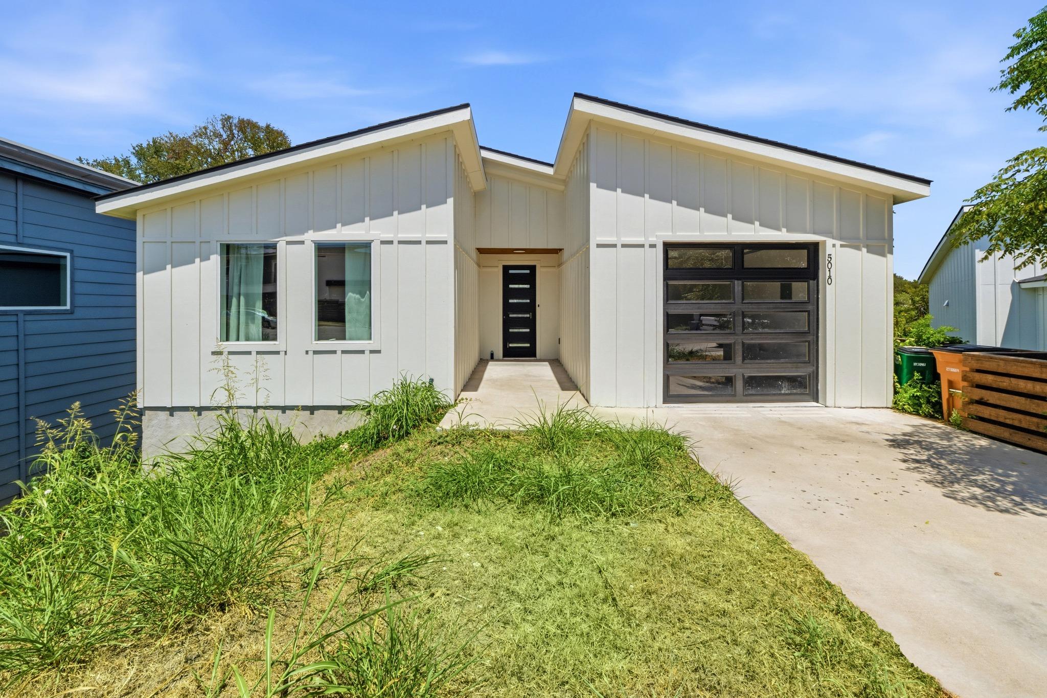 Modern vertical siding and clean architectural li