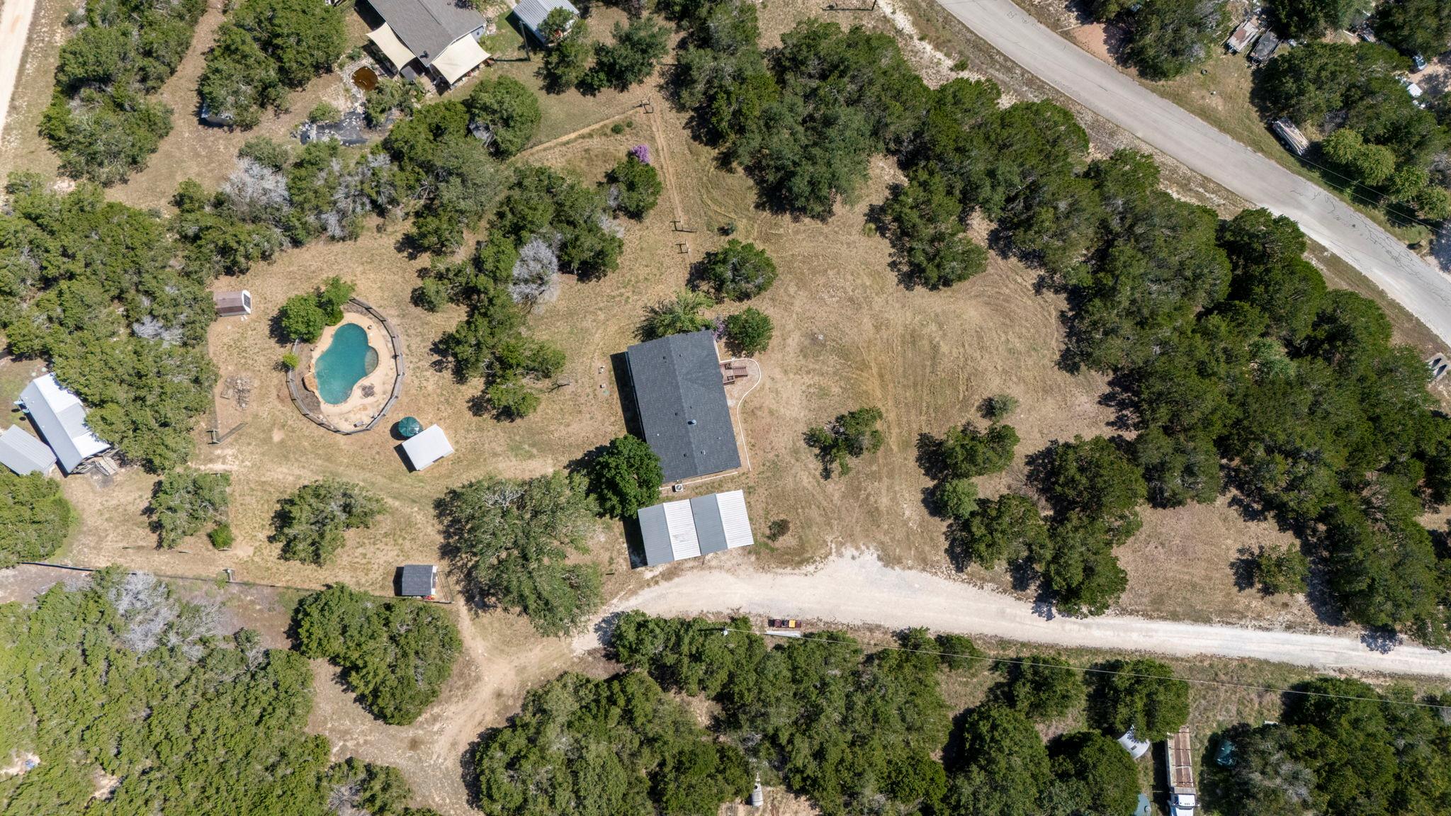 An aerial perspective reveals a private pool oasi