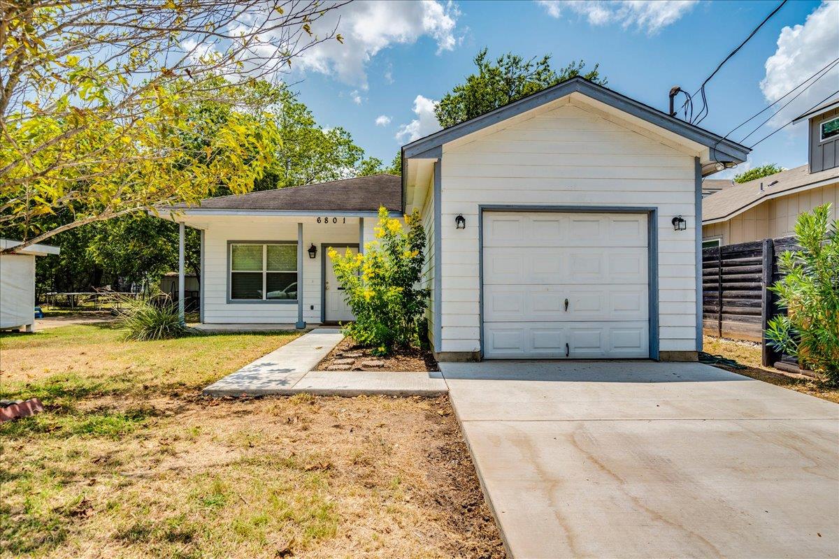 A well-maintained single-story home with an attac