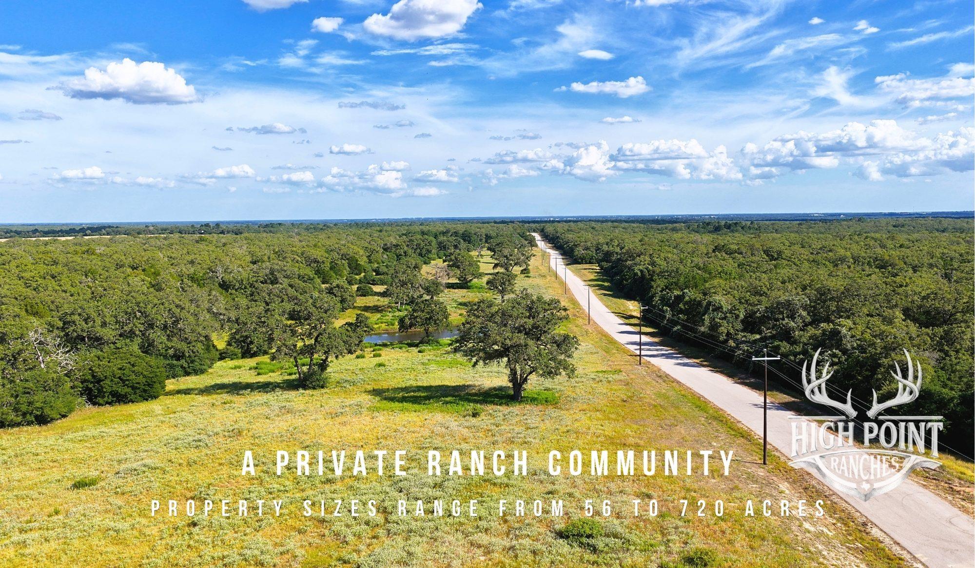 Vast natural terrain with mature trees and open f