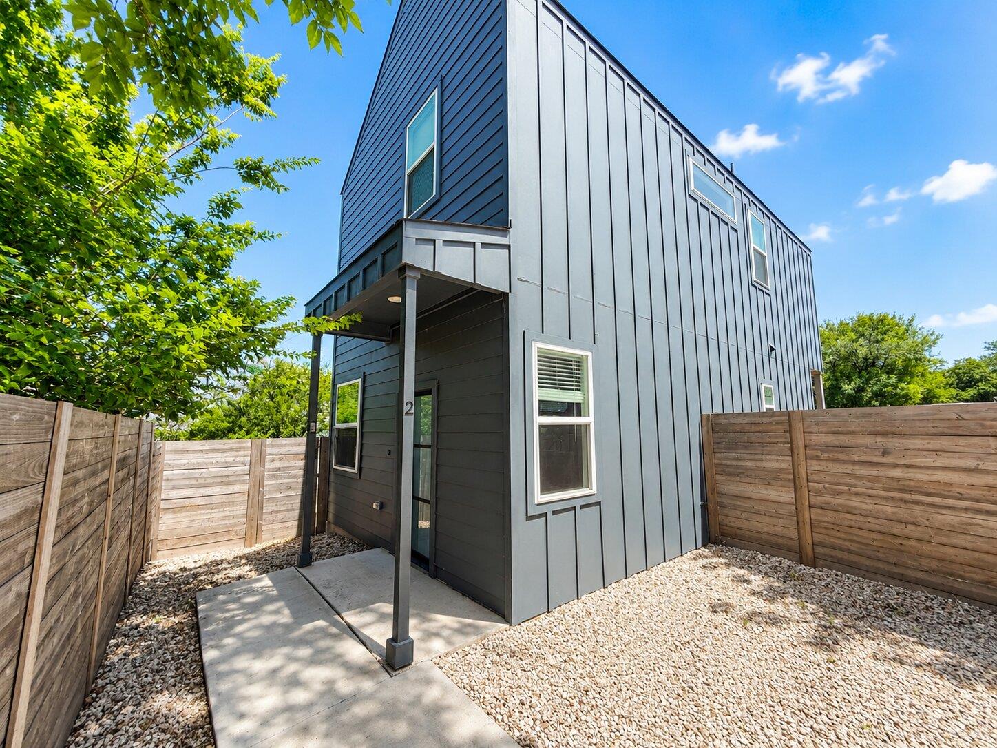 A private entry leads to a contemporary residence