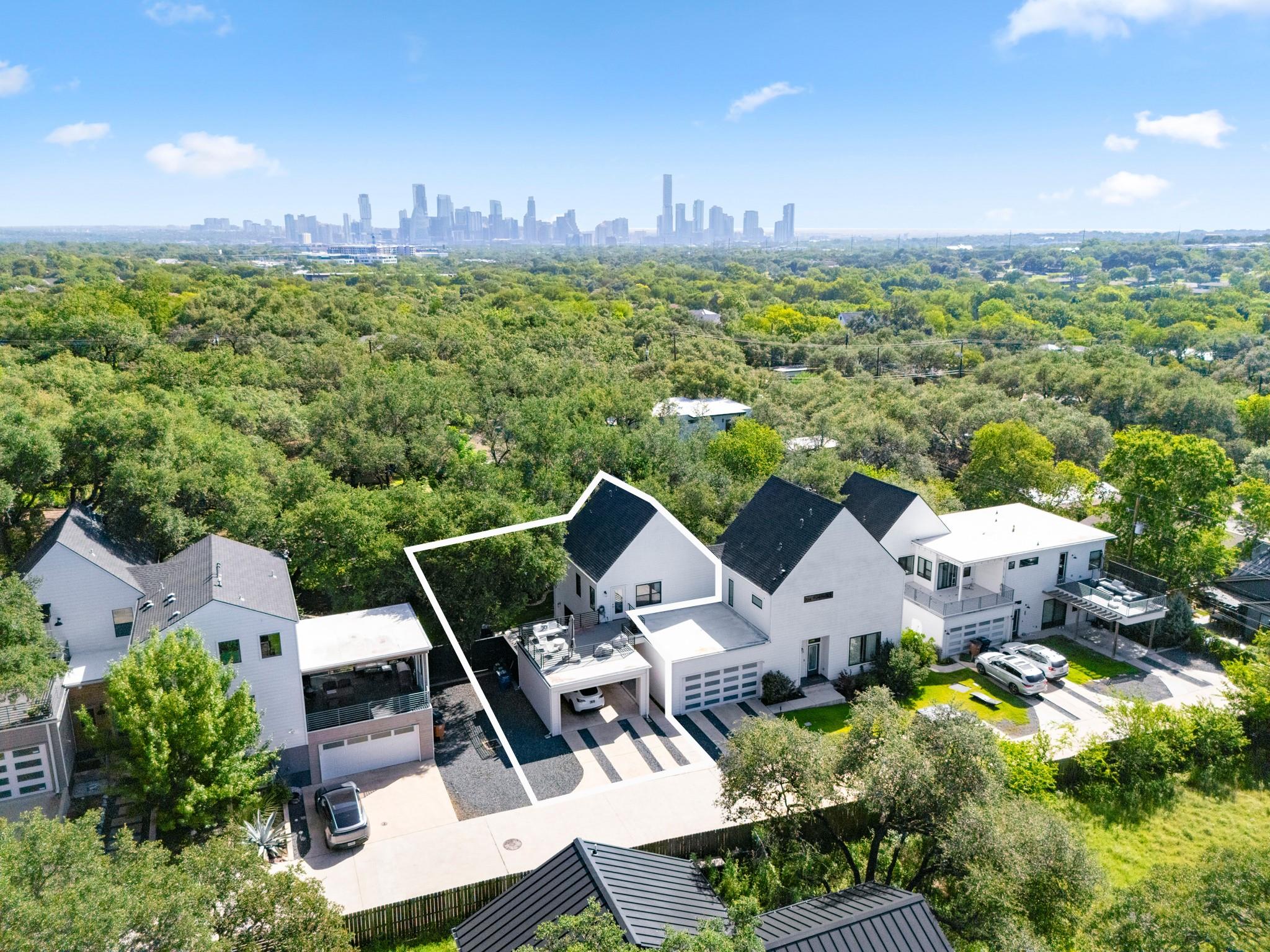 An aerial perspective reveals a modern residence 