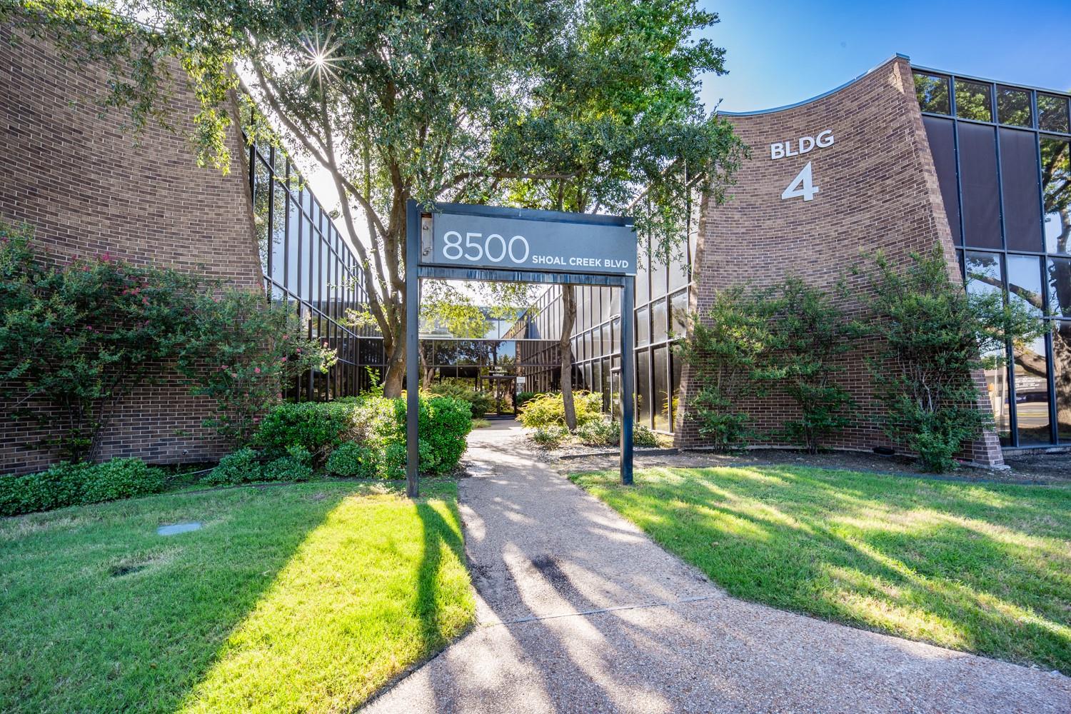 A well-maintained brick building features extensi