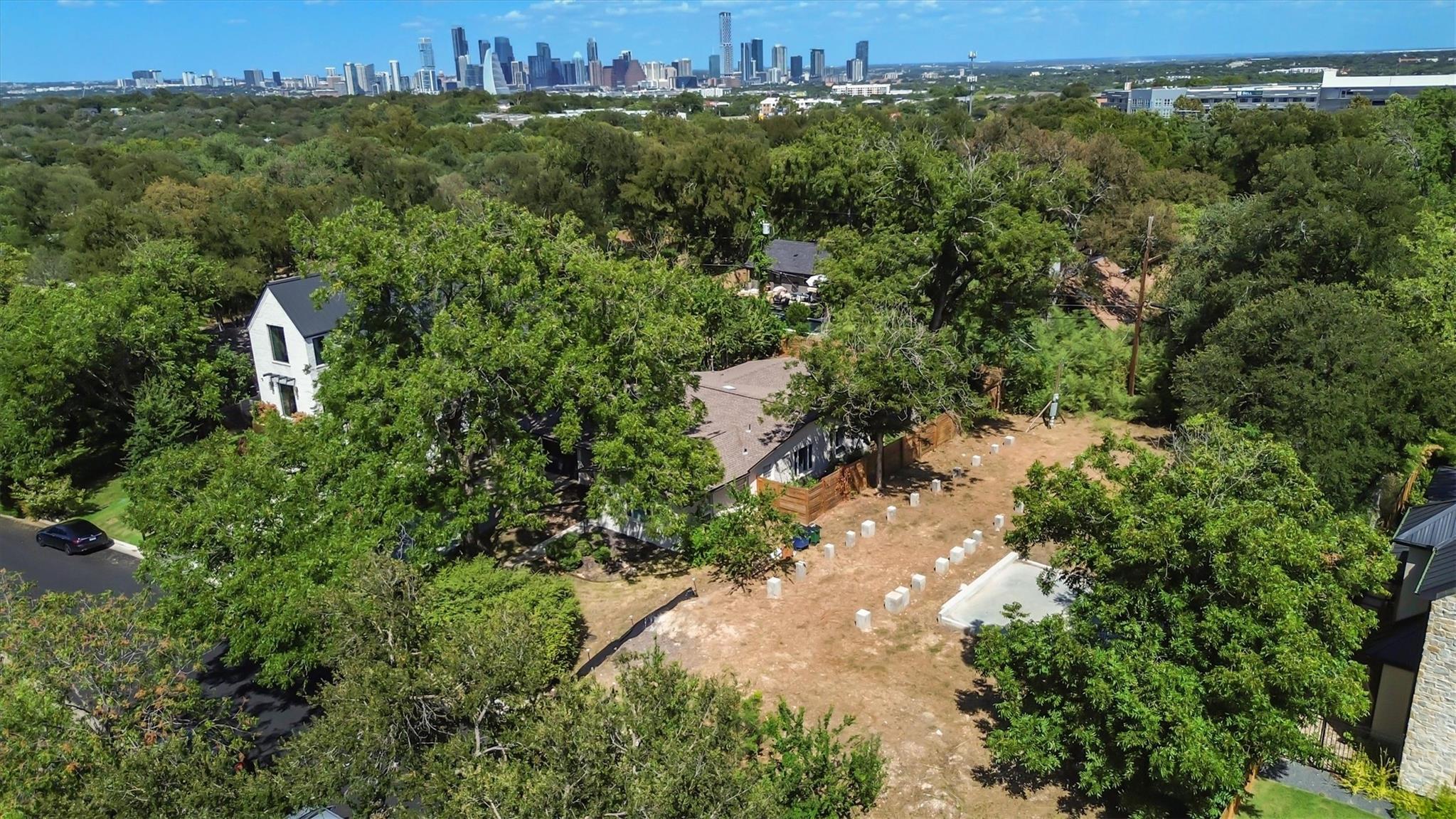 Mature trees surround this property, which overlo