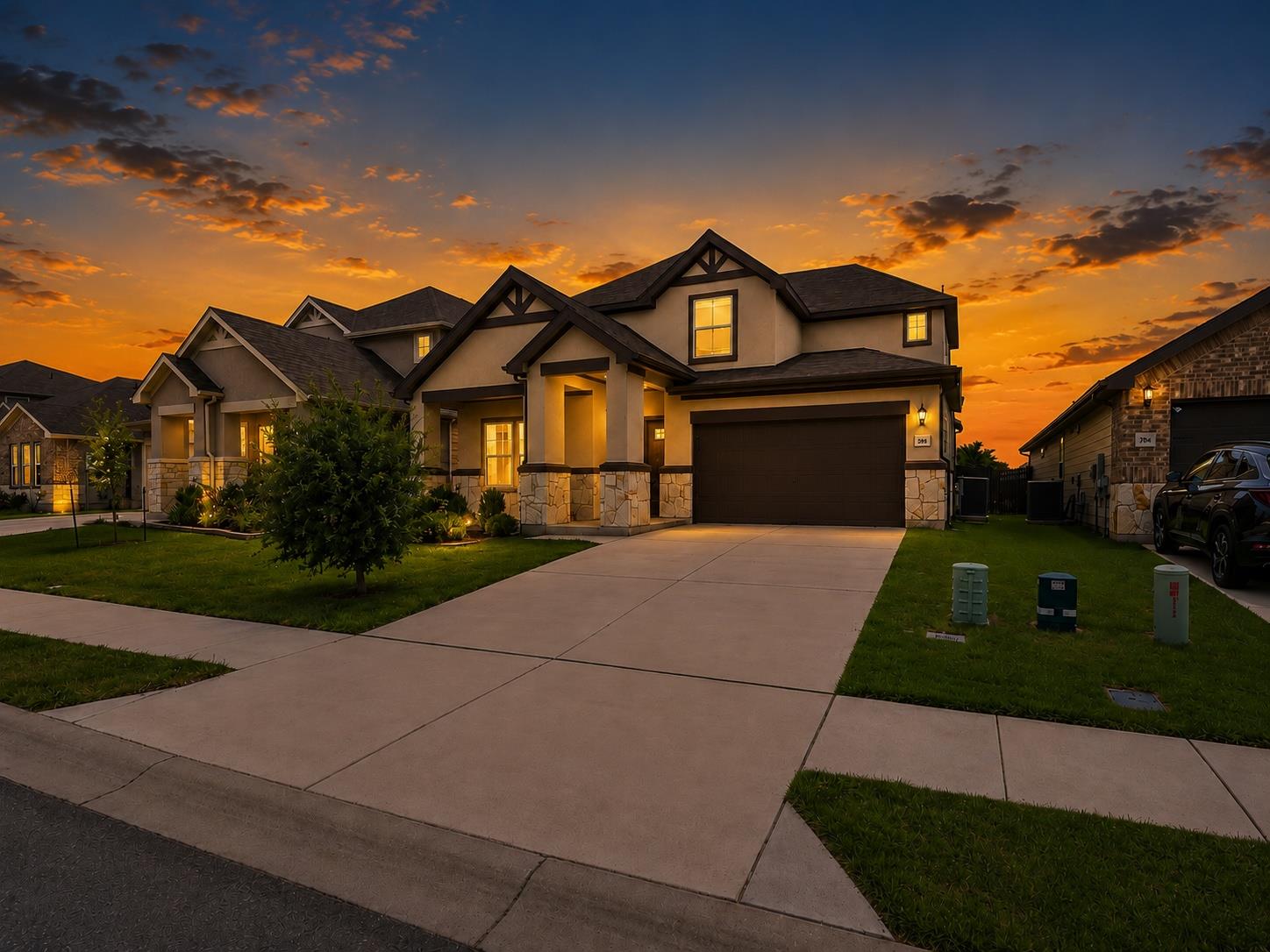 Dramatic sunset hues illuminate the elegant stone