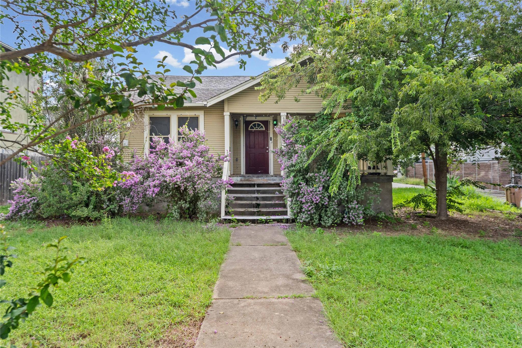 A charming bungalow with a welcoming front porch 