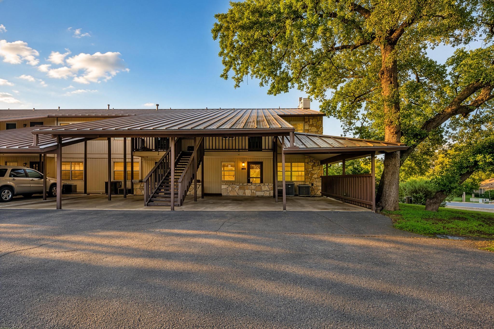 A welcoming facade with a covered walkway and ext