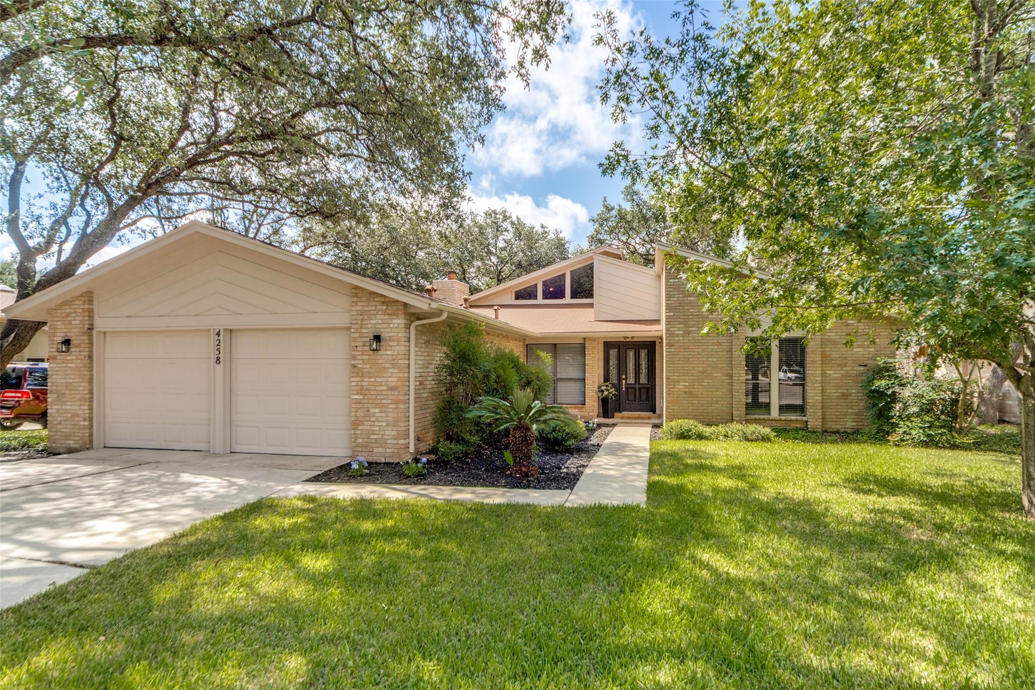 A classic brick facade welcomes you to this charm