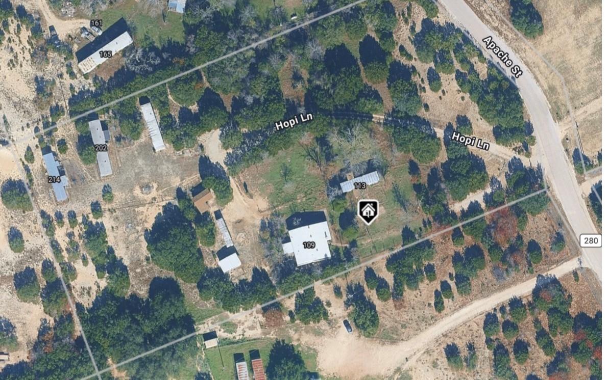 An aerial view showcases a residential property n