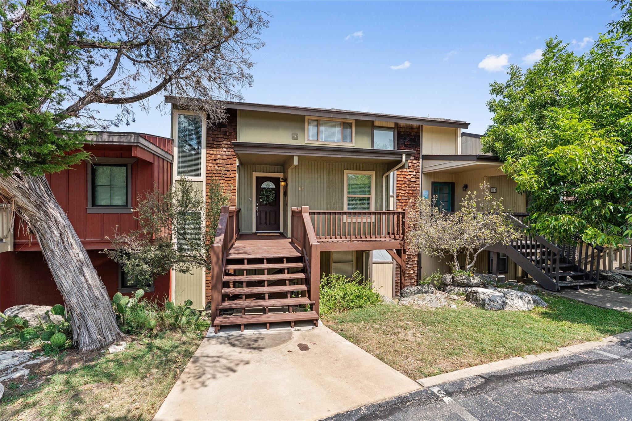 A welcoming front entrance with a wooden porch an