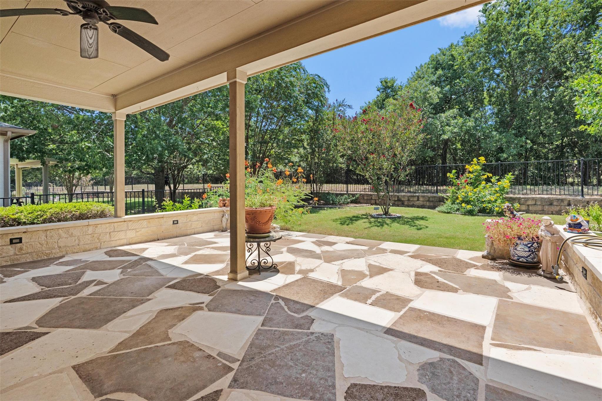 Flagstone flooring defines this sheltered outdoor