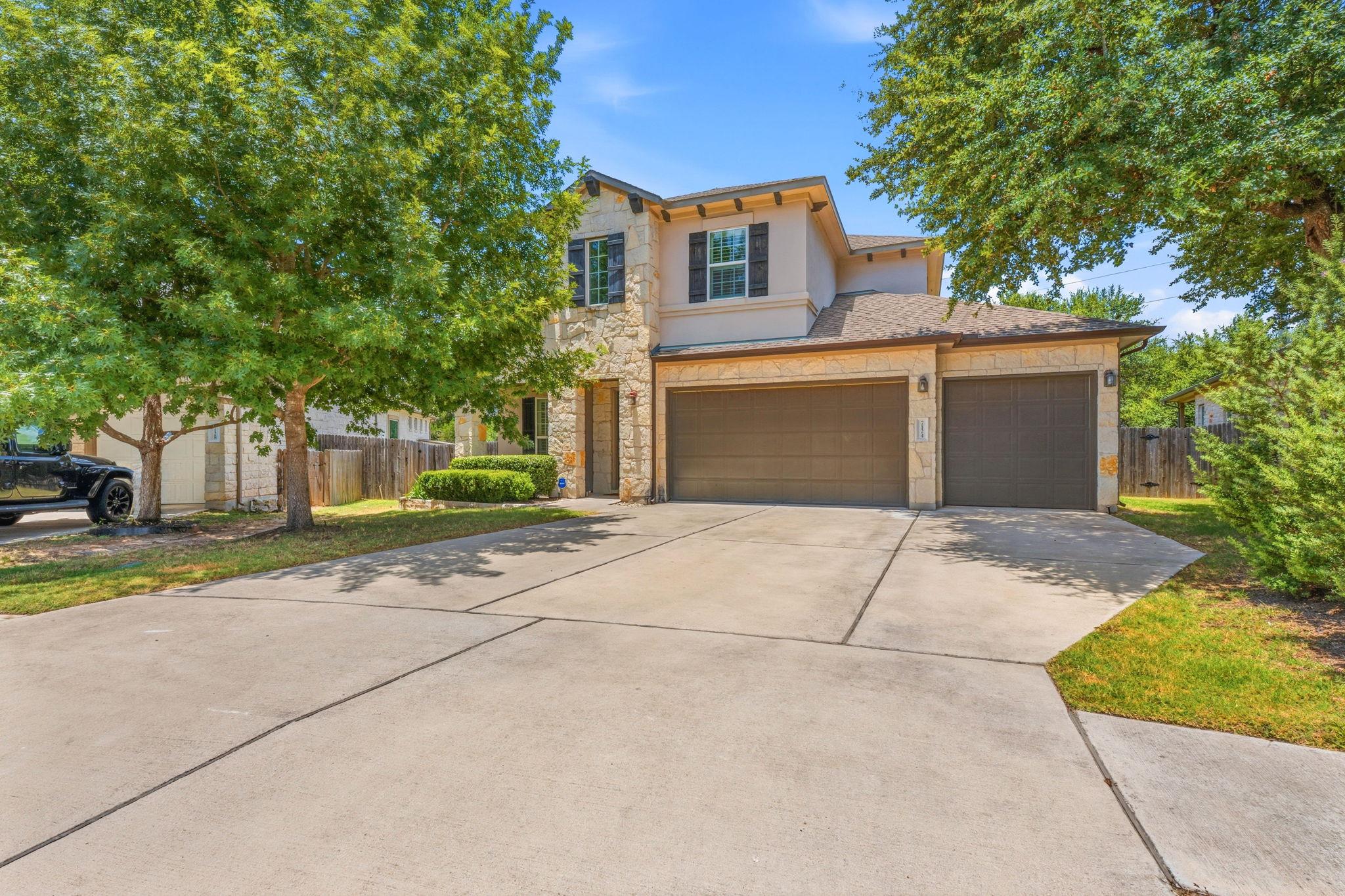 A welcoming home with a stone and stucco facade, 