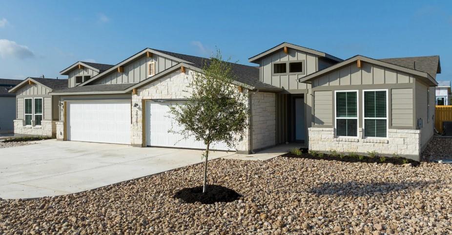 A contemporary residence showcasing stone and boa