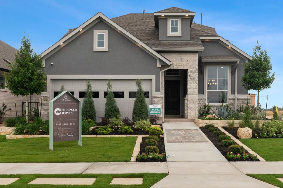 Modern stone and stucco facade complements vibran