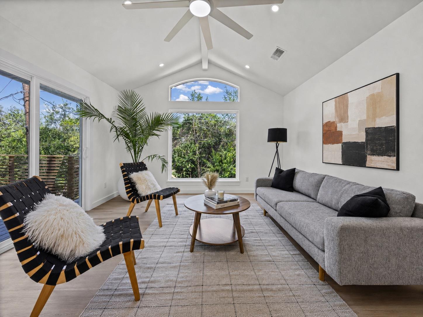A living area with vaulted ceilings and a stunnin