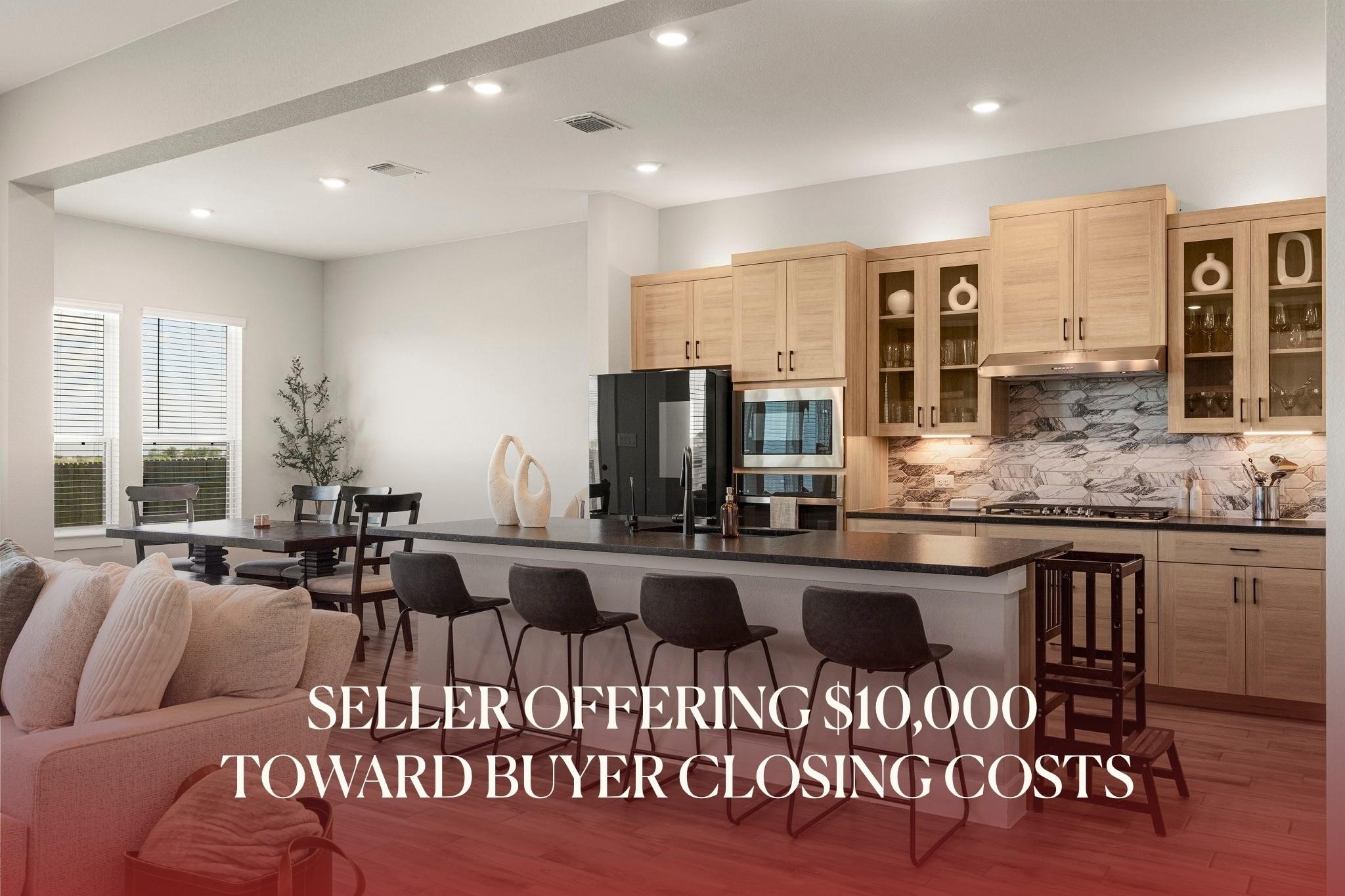 Gleaming wood floors run through this open-concep