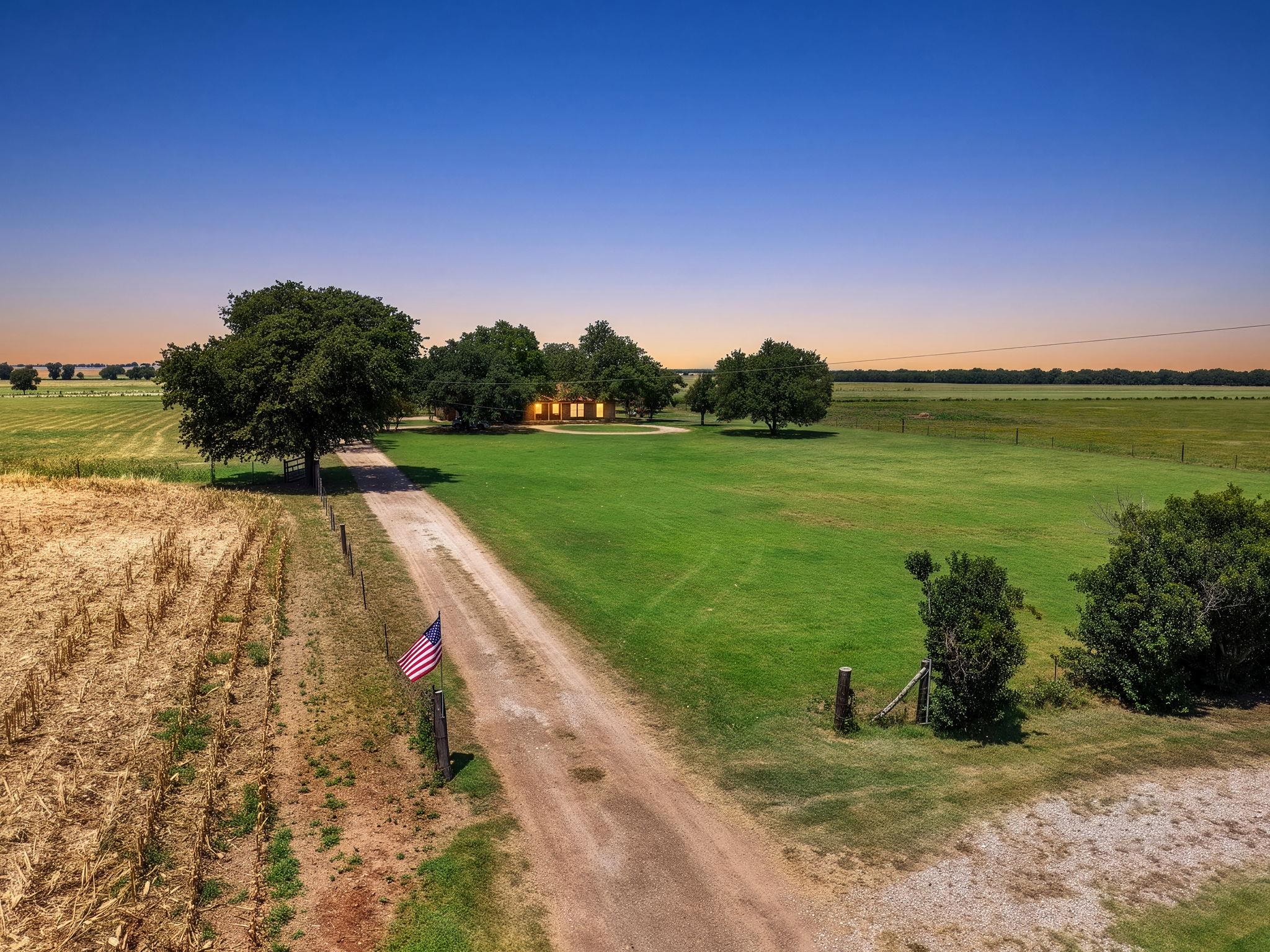A long, private driveway guides you to a secluded