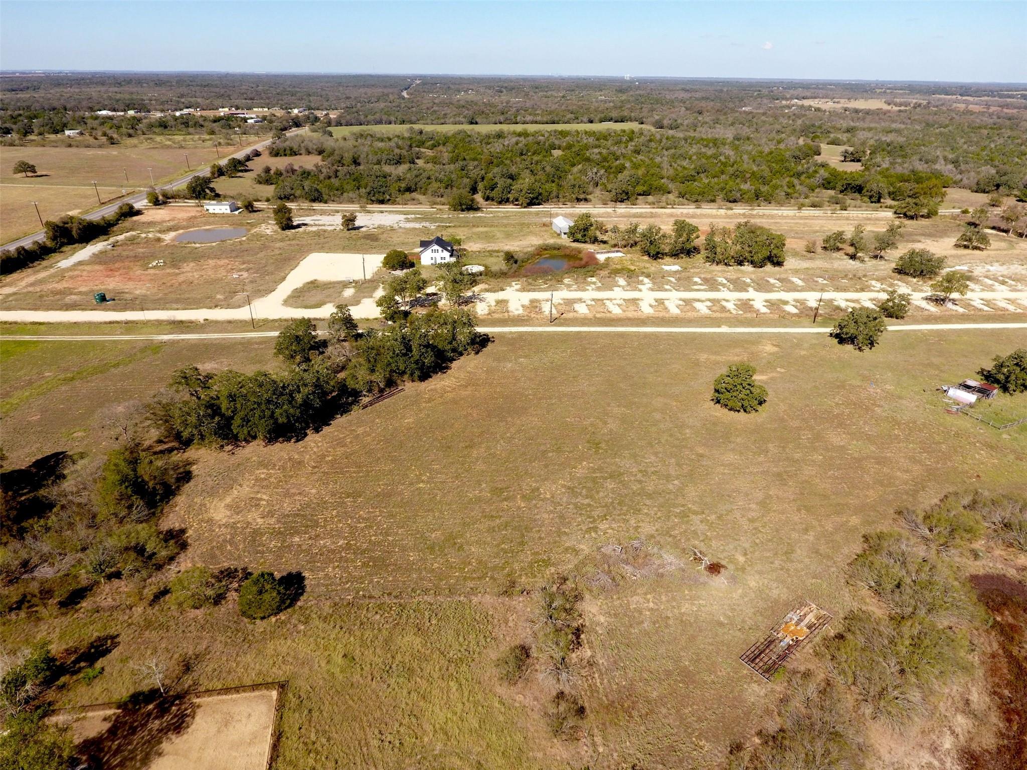 An aerial perspective captures vast acreage surro