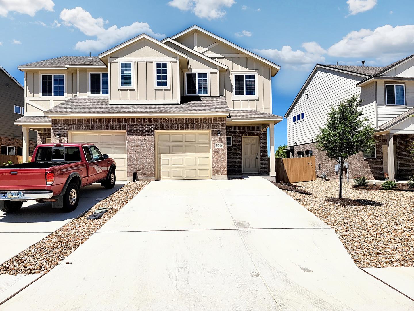 A striking facade with brick and siding accents o