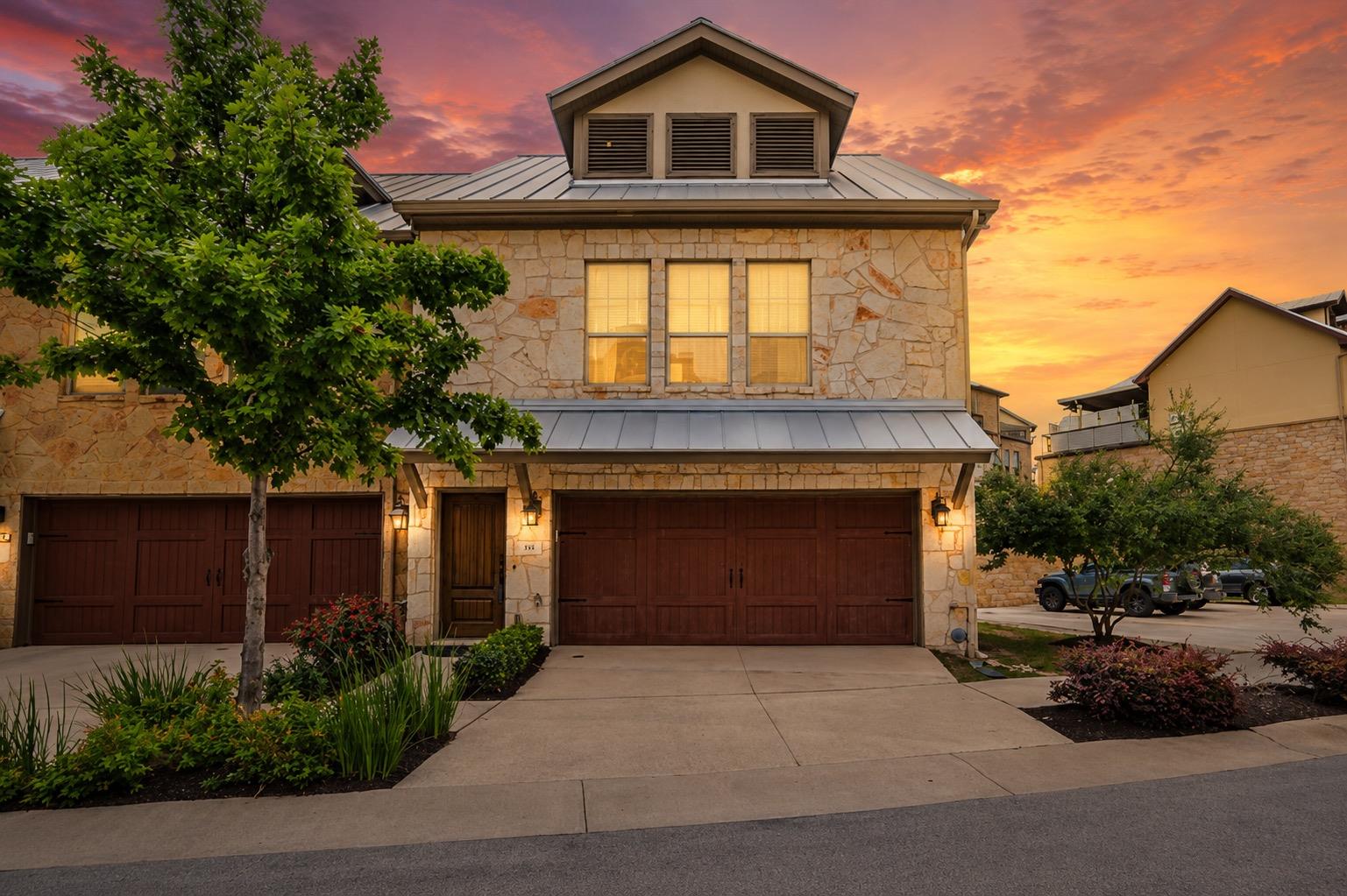 Natural stone masonry and a classic metal roof de