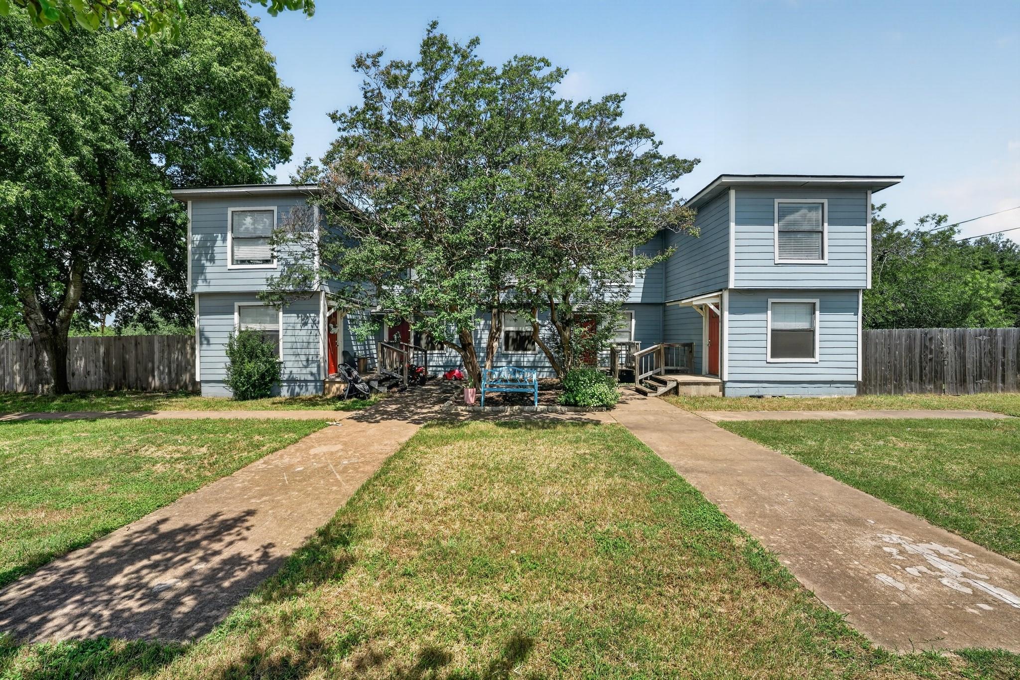 A well-maintained duplex with dual entrances and 