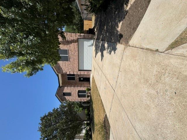 Brick exterior highlights the multi-level design 
