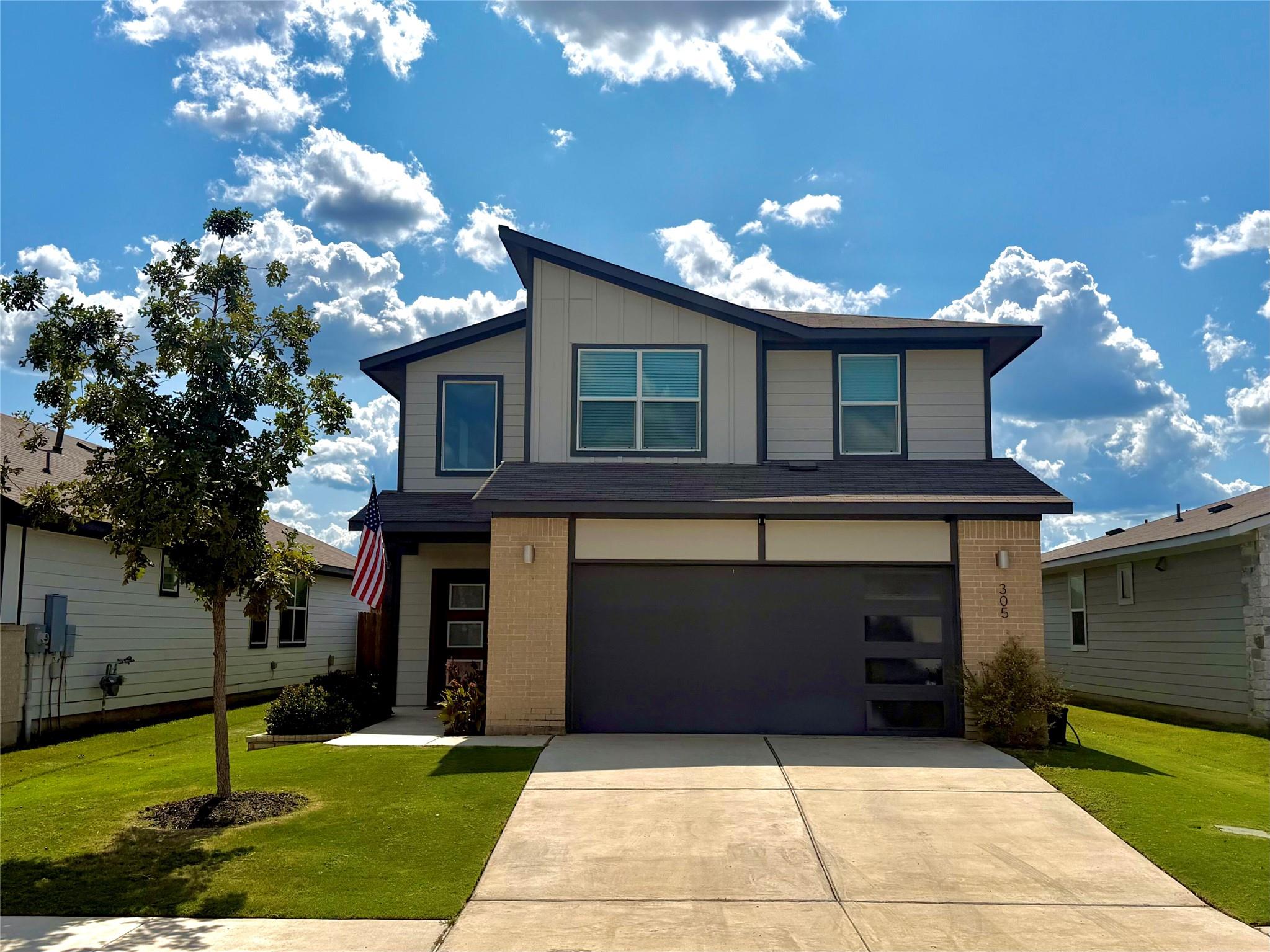 Striking contemporary lines and mixed exterior te