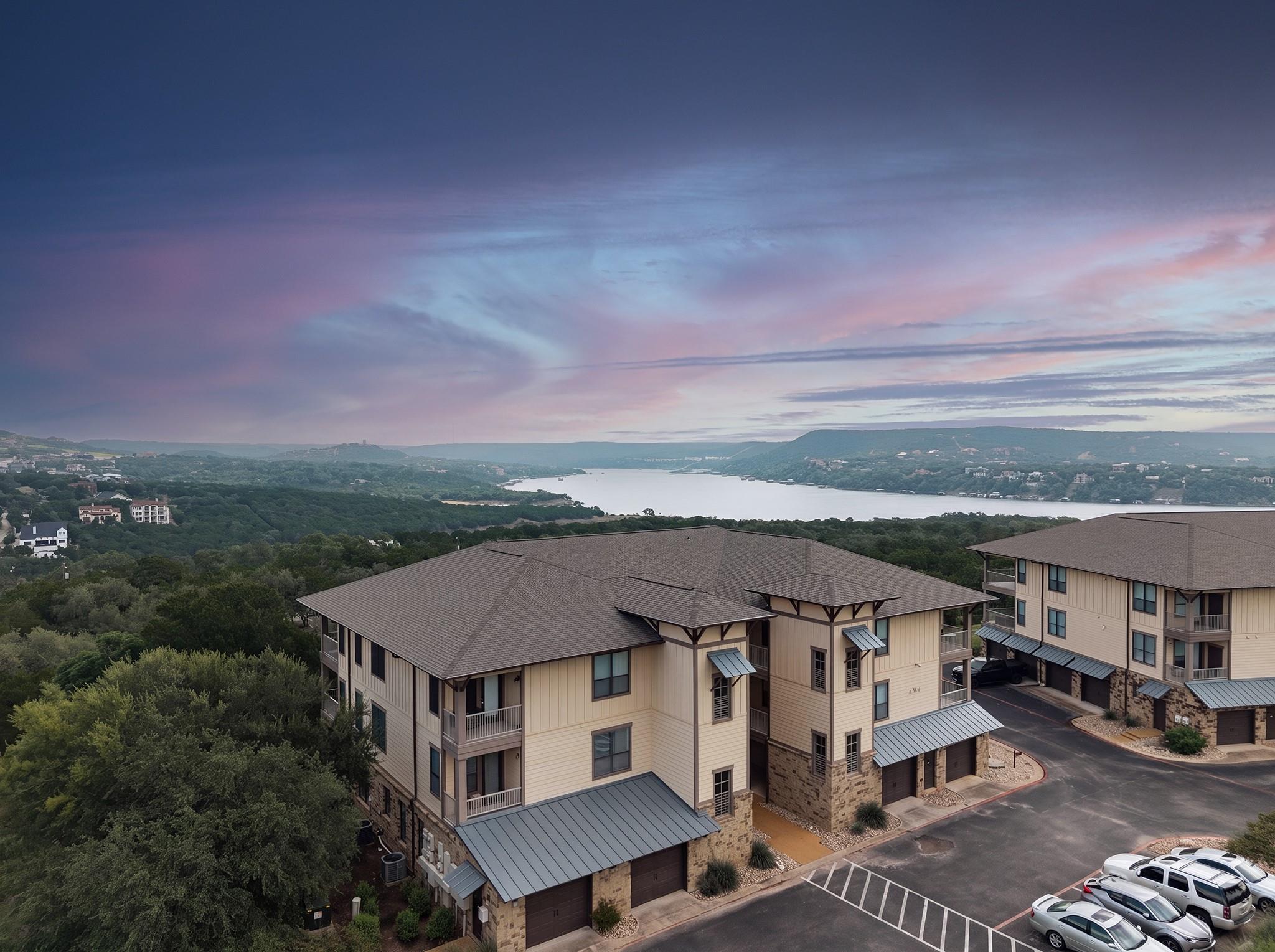 Perched atop a hill, this apartment complex comma