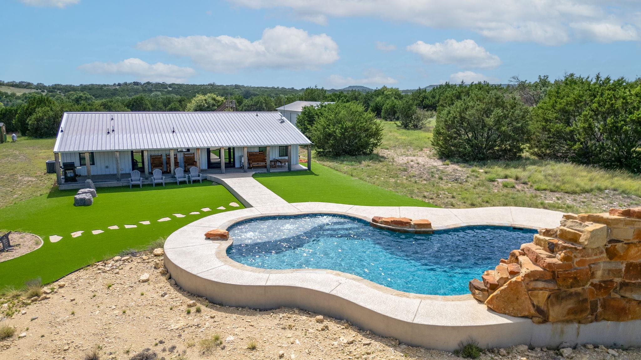A tranquil retreat featuring a unique pool and ge