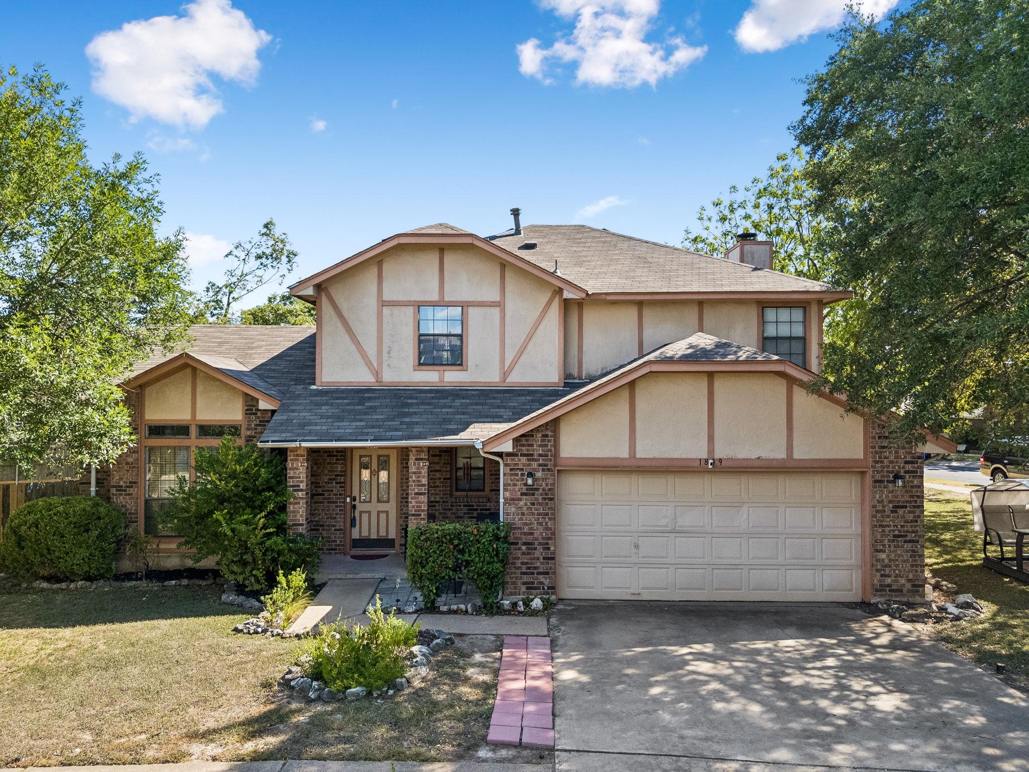 Classic brick and timber accents define this trad