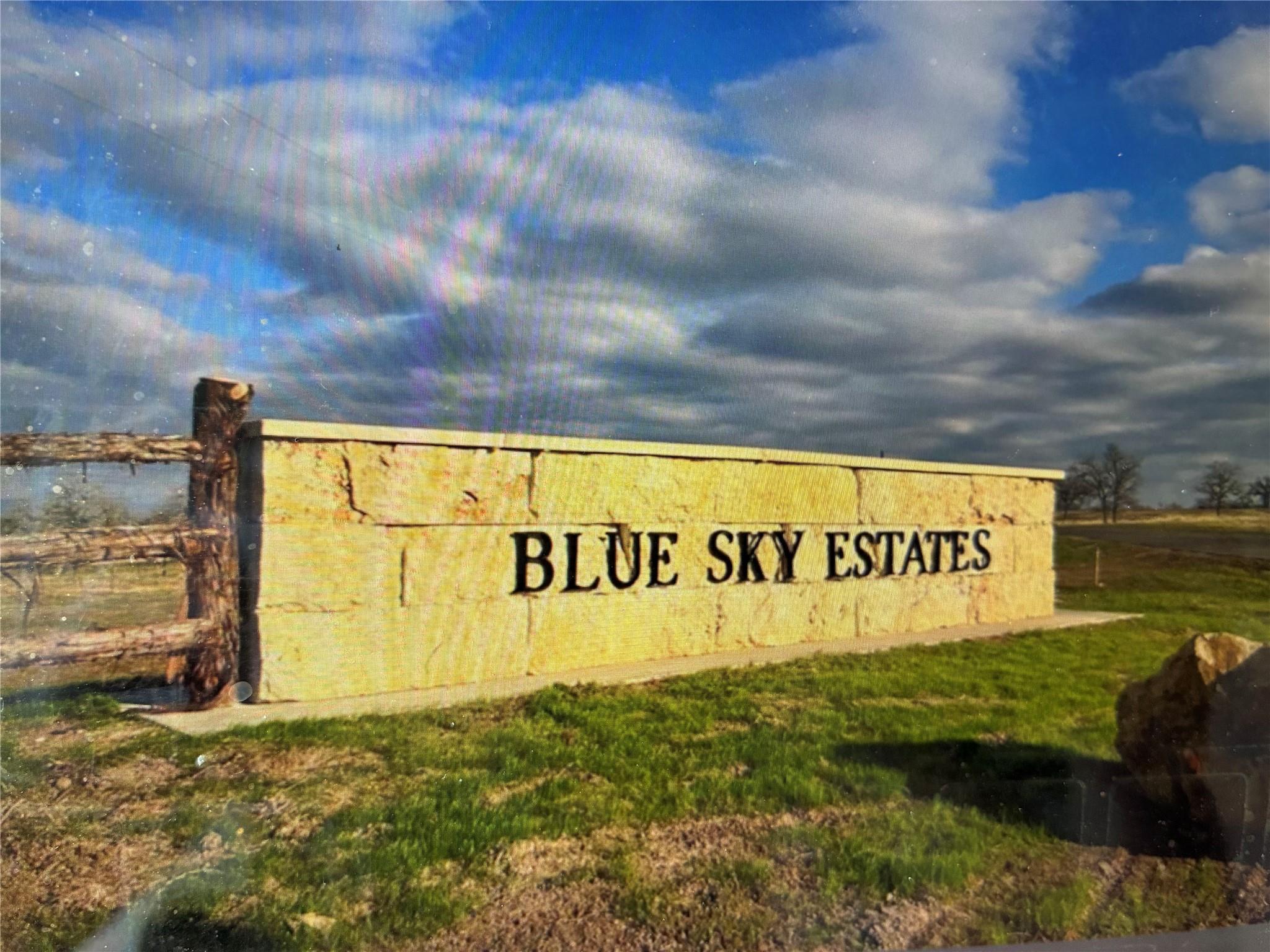 A grand stone monument welcomes all to the exclus