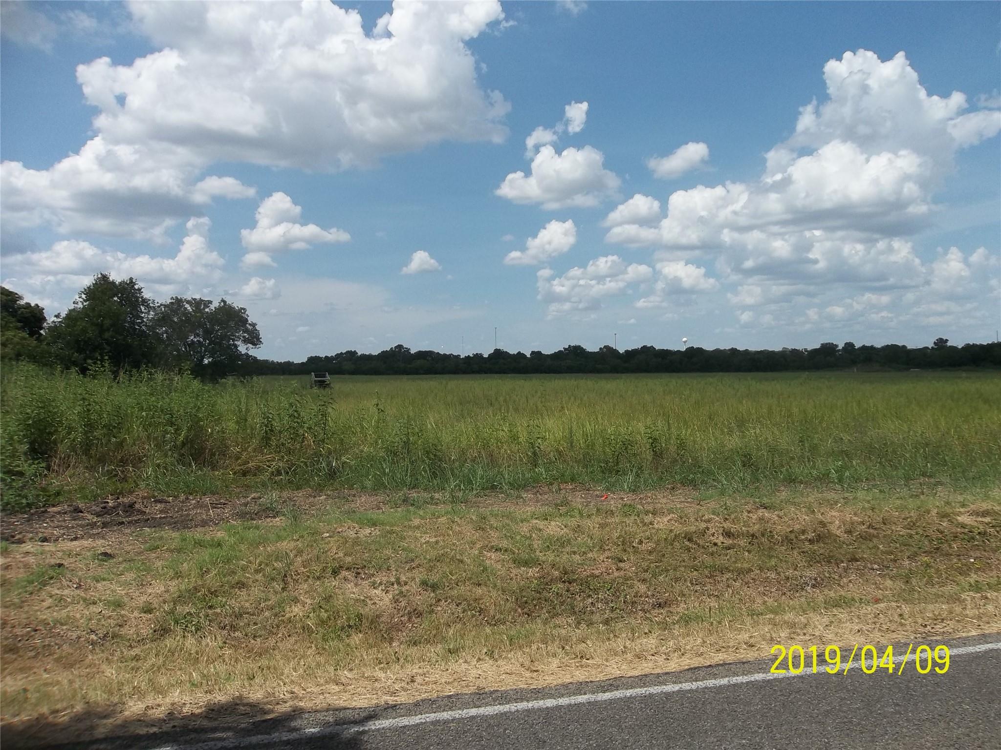 A vast, green expanse of undeveloped land offers 
