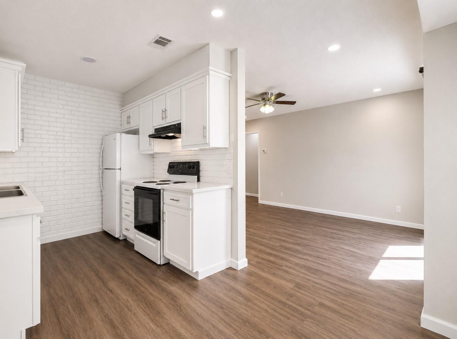 Clean lines and stone counters highlight this upd